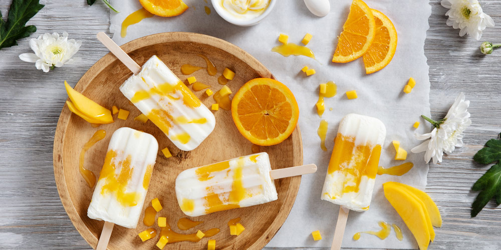 Mascarpone-Joghurt-Popsicles mit Orange Mango