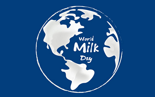 Eine stilisierte Weltkugel aus Milchklecksen mit dem Schriftzug "World Milk Day"